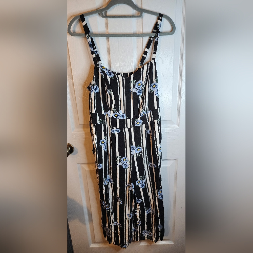 Torrid Black and White Striped Jumpsuit with Blue Floral Accents